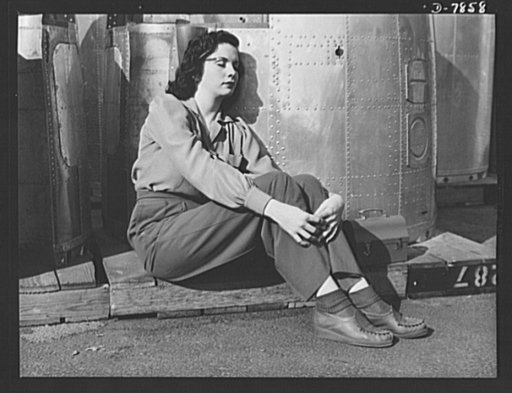 Production. Airplane maufacture, general. A noontime rest for a full- fledged assembly worker at the Long Beach, California, plant of Douglas Aircraft Company. Nacelle parts for a heavy bomber form the background. Most important are the many types of aircraft made at this plant are the B-17F ("Flyin