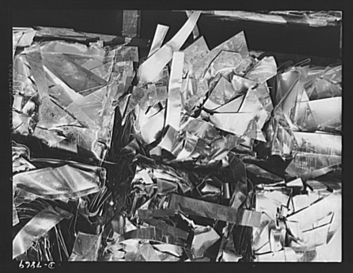 Production. Airplane maufacture, general. At the Long Beach, California, plant of Douglas Aircraft Company, scrap metal is carefully segregated in separate boxes for the maximum salvage at the smelter. Most important of the many types of aircrafts made at this plant are the B-17F ("Flying Fortress")