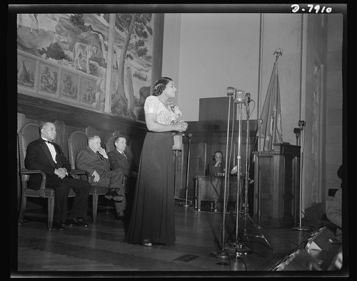 Marian Anderson mural dedicated. Marian Anderson, noted contralto, sings a Negro spiritual at the dedication of a mural commemorating her free public concert on the steps of the Lincoln Memorial on Easter Sunday, 1939. The dedication was held in the Department of Interior Auditorium before a disting