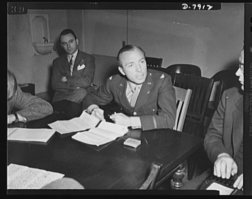 Colonel Johnson's press conference. Colonel Robert Johnson, vice chairman of the War Production Board (WPB) in charge of smaller war plants corporation, outlines plans for the SWPC at his first press conference February 16, 1943 after assuming office