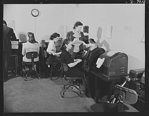 Office of War Information News Bureau. Disseminating war news is the primary task of the News Bureau of the OWI. This is the teletype room of OWI--the nerve center of the world news of the war. These instruments connect OWI offices all over the world