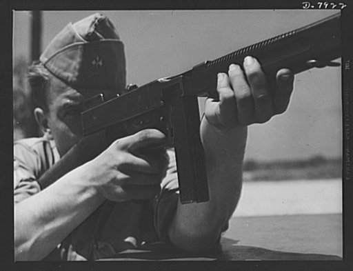 Fort Knox. Machine guns. The .45 caliber Thompson sub-machine gun, familiarly known as the Tommy gun, is a hand weapon for which every branch of the service finds many uses. Its portability and effectiveness makes it a favorite of our modern Army