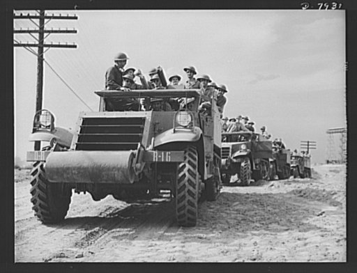 Fort Knox. Halftrac crews. A column of halftrac armored cars waits for orders to proceed to a practice engagement at Fort Knox, Kentucky. The Fort Knox school for men of the armored service is teaching many American soldiers how to use mechanized striking equipment to best advantage. Its graduates a