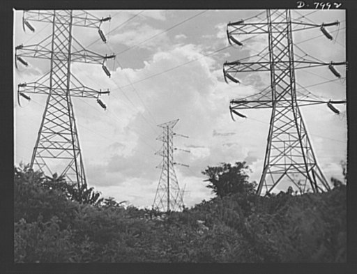 Tennessee Valley Authority. Transmission line towers and high-tension lines that carry current generated at the TVA's hydroelectric plant at Wilson Dam. Located near Sheffield, Alabama, 260 miles above the mouth of the Tennessee River, the dam has an authorized power installation of 288,000 kilowatt