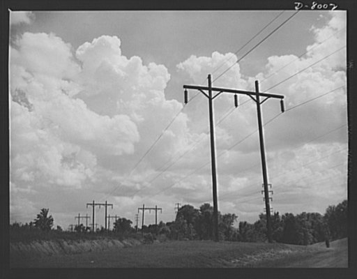 Tennessee Valley Authority. Pole line carrying 110-volt current generated at TVA's hydroelectric plant at Wilson Dam. Located near Sheffield, Alabama, 260 miles above the mouth of the Tennessee River, the dam has an authorized power installation of 288,000 kilowatts, which can be increased to a poss