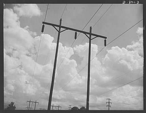 Tennessee Valley Authority. Pole line carrying 110-volt current generated at TVA's hydroelectric plant at Wilson Dam. Located near Sheffield, Alabama, 260 miles above the mouth of the Tennessee River, the dam has an authorized power installation of 288,000 kilowatts, which can be increased to a poss