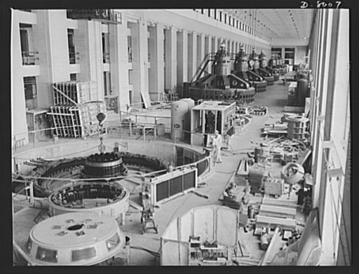 Tennessee Valley Authority. The stator, rotor and exciter of a new generator unit in place at TVA's hydroelectric plant at Wilson Dam. Completed units show in the background. Located near Sheffield, Alabama, 260 miles above the mouth of the Tennessee River, the dam had an authorized power installati