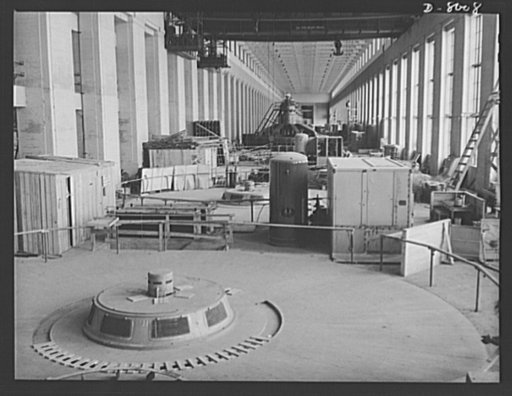 Tennessee Valley Authority. A cover plate and exciter housing of a new generator unit in place at TVA's hydroelectric plant at Wilson Dam. Completed units show in the background. Located near Sheffield, Alabama, 260 miles above the the mouth of the Tennessee River, the dam had an authorized power in