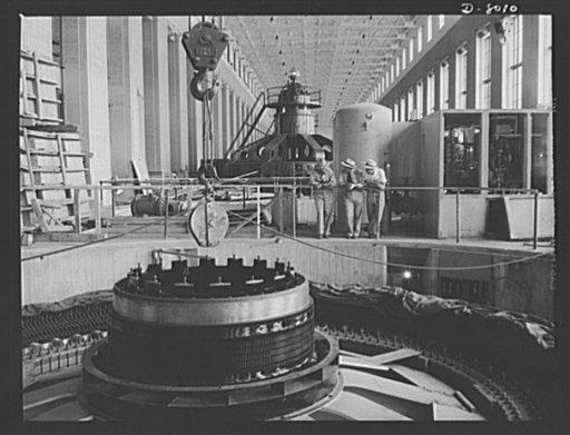 Tennessee Valley Authority. A partly completed generator in the new addition to TVA's hydroelectric plant at Wilson Dam. A long line of completed generators extends back the full length of the room. Located near Sheffield, Alabama, 260 miles above the mouth of the Tennessee River, the dam had an aut