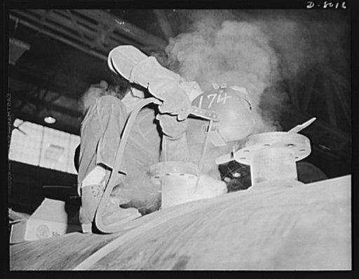 Production. Steam power plant equipment. Welding a nozzle on a new high-pressure boiler by electric arc method. Steam boilers and other power-house equipment to supplement the hydroelectric installations of the Tennessee Valley Authority (TVA) system are produced in the large Chattanooga shops of th