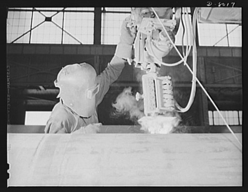 Production. Steam power plant equipment. An automatic electric arc-welder runs a long seam on a new high-pressure boiler. Steam boilers and other power-house equipment to supplement the hydroelectric installations of the Tennessee Valley Authority (TVA) system are produced in the large Chattanooga s