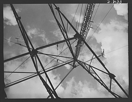 Production. Steam power plant equipment. Erecting the structural work of a new shop for the machining of marine boiler headers. Steam boilers and other power-house equipment to supplement the hydroelectric installations of the Tennessee Valley Authority (TVA) system are produced in the large Chattan
