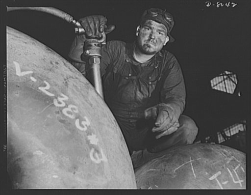 Production. Steam power plant equipment. A workman with a large chipping hammer prepares to cut away excess metal in a girth seam of a high-pressure boiler drum. Steam boilers and other power-house equipment to supplement the hydroelectric installations of the Tennessee Valley Authority (TVA) system