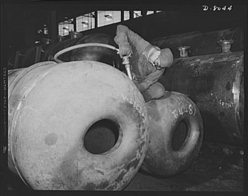 Production. Steam power plant equipment. Chipping away excess metal on a girth seam of a high-pressure boiler drum. Steam boilers and other power-house equipment to supplement the hydroelectric installations of the Tennessee Valley Authority (TVA) system are produced in the large Chattanooga shops o