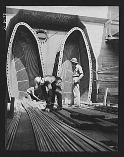 Tennessee Valley Authority. Watts Bar Dam hydroelectric plant. Installing tubes in condensers at TVA's Watts Bar steam plant. This plant will supplement the big hydroelectric installation at Watts Bar Dam, which has an authorized output of 90,000 kilowatts, and a possible ultimate of 150,000 kilowat