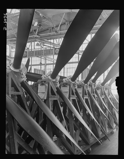 Production. Airplane propellers. Assembled three-way Hamilton propellers  ready for shipment, minus power section, from a Hartford, Connecticut, plant. When installed on a warplane, this type of propeller will be fitted with a hydromatic mechanism that varies the blade pitch during flight