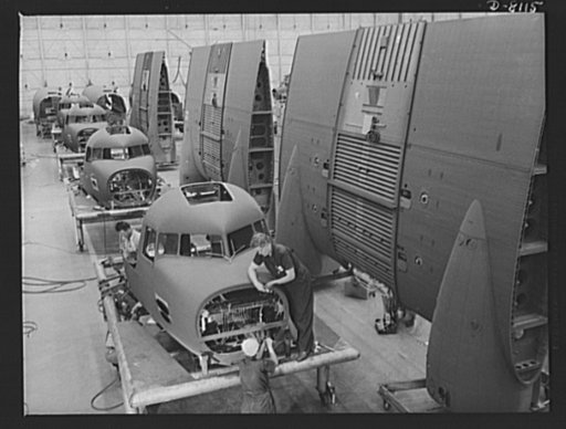 Production. C-47 transport planes. Noses and center wings for Douglas C-47 transport planes move toward the assembly line at the Long Beach, California, plant of Douglas Aircraft Company, where they will be joined to their assigned fuselages. The versatile C-47 performs many important tasks for the 