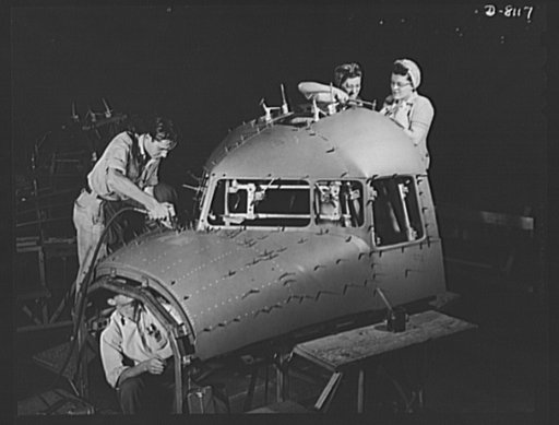 Production. C-47 transport planes. Teams of men and women work efficiently to prepare a C-47 transport plane for riveting operations at the Long Beach, California, plant of Douglas Aircraft Company. The versatile C-47 performs many important tasks for the Army. It ferries men and cargo across the oc