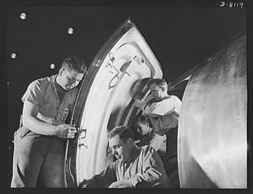Production. C-47 transport planes. Tons of vital war materials will pass through this cargo door of a C-47 transport plane under construction at the Long Beach, California, plant of Douglas Aircraft Company. The versatile C-47 performs many tasks for the Army. It ferries men and cargo across the oce