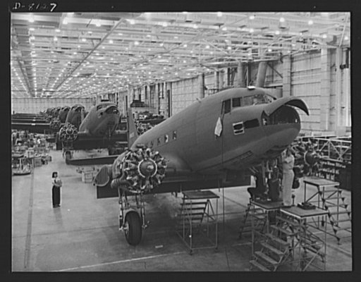 Production. C-47 transport planes. A long line of C-47 transport planes awaits the installation of wing at the Long Beach, California, plant of Douglas Aircraft Company. The versatile C-47 performs many important tasks for the Army. It ferries men and cargo across oceans and mountains, tows gliders 