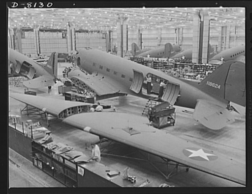 Production. C-47 transport planes. A long line of C-47 transport planes awaits the installation of wings at the Long Beach, California, plant of Douglas Aircraft Company. The versatile C-47 performs many important tasks for the Army. It ferries men and cargo across oceans and mountains, tows gliders