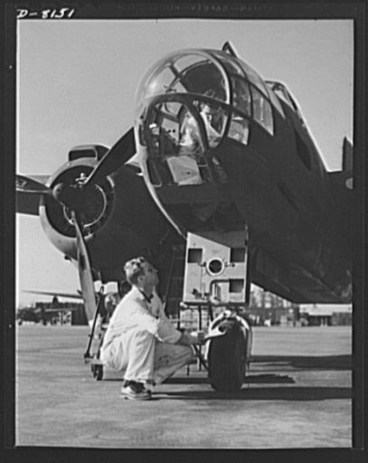 Production. A-20 attack bombers. Mechanics work in a "goldfish bowl", or bombardiers's compartment, of an A-20 attack bomber on the flight ramp of the Long Beach, California, plant of Douglas Aircraft Company. The A-20 is used by the American Air Force and Royal Air Force (RAF) for hedge hopping and
