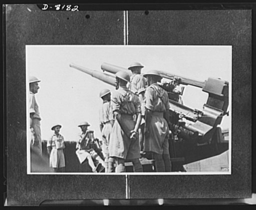 Indian troops in East Africa. Operating a gun