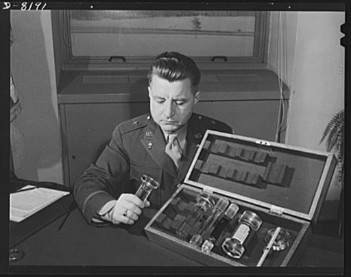 Conservation. Glass gauges replacing steel. Brigadier General H.F. Safford, Chief of Production Service Branch, Ordnance Department, examines an exhibit of standard types of new glass gauges which replace steel gauges at the Frankford Arsenal. Glass gauges are lighter and cheaper than steel, permit 