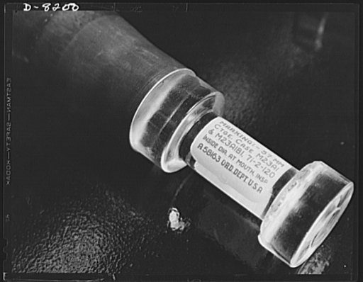 Conservation. Glass gauges replacing steel. Checking the inside diameter of a cartridge case with one of the glass gauges, which are replacing steel gauges at the Frankford Arsenal. Glass gauges are lighter and cheaper than steel, permit greater visibility in inspection, are not as much affected by 