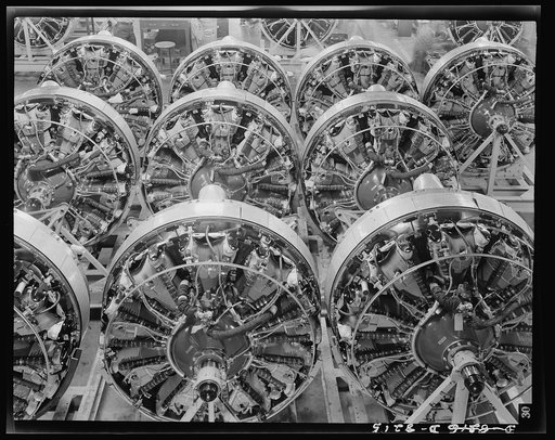 Production. B-17 heavy bomber. 1200-horsepower Wright engines for B-17F (Flying Fortress) bombers ready for installation on the mighty warships of air at the Boeing plant in Seattle. The Flying Fortress has performed with great credit in the South Pacific, over Germany and elsewhere. It is a four-en