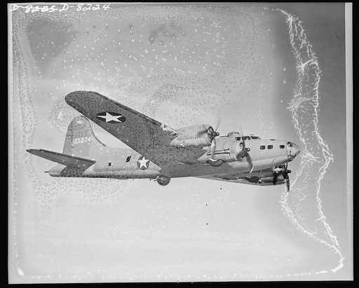 Flying Fortress. Symbol of American might. Test flight. Considerably changed from earlier models, latest type Boeing Flying Fortress contains many improvements of internal detail, making bomber tougher, more effective