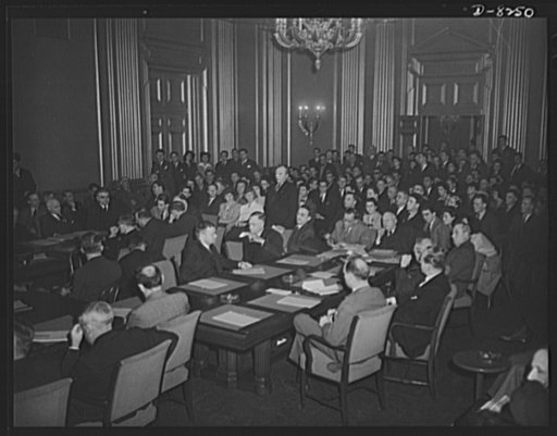 War Labor Board anthracite hearing. United Mine Workers (UMW) officials at left and coal operators at right at anthracite strike hearing held before National War Labor Board, January 15, 1943