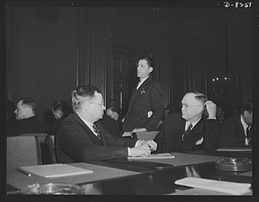 War Labor Board anthracite hearing. Operators of the collieries (seated) hear a local union official testify before the National War Labor Board on the anthracite strike hearing, held January 15, 1943