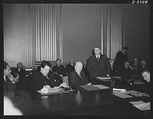 War Labor Board anthracite hearing. Richard Frankensteen, Vice-President of United Automobile Workers, Congress of Industrial Organizations (UAW-CIO), left; Fred Hewitt, Editor IAM Journal, International Association of Machinists, American Federation of Labor (AFL); and labor members of the War Labo