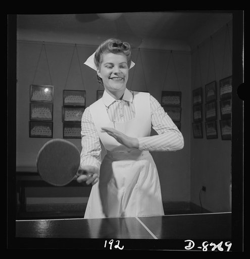 Nurse training. At the ping pong table in the game room, Susan Petty, student nurse, enjoys a bit of relaxation after a busy day's work in the wards