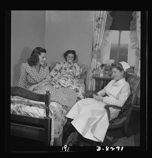 Nurse training. Given an hour's rest between rounds, Susan Petty, student nurse, is visited by her fellow nurses in her small but comfortable room in the School of Nursing resident hall. The girls, who are off duty for a longer period, have changed from their uniforms to house coats