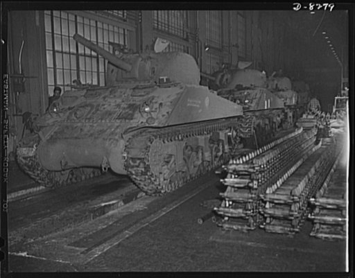 Production. M-4 tanks. The new M-4 tanks which will soon be hurling their might against the Axis roll toward the end of the production line in the Schenectady, New York, plant of the American Locomotive Company. M-7 mobile howitzer carriages are also made in this plant