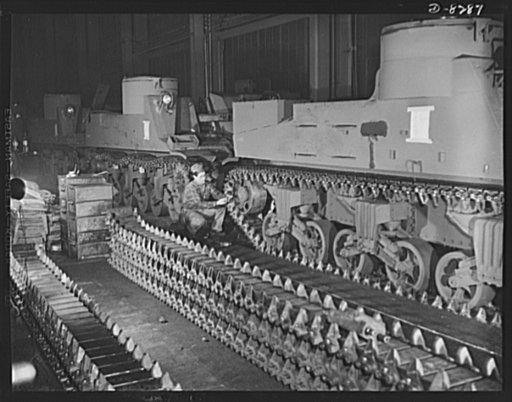 Winner of the plant award. New M-7 mobile howitzer carriages roll down the production lines of the American Locomotive Company in Schenectady, New York. These fast, easily maneuvered cannon carriers are typical of the new mechanized equipment being provided to American troops