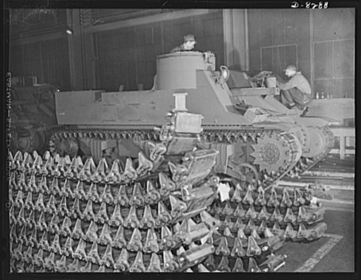 Winner of the plant award. New M-7 mobile howitzer carriages roll down the production lines of the American Locomotive Company in Schenectady, New York. These fast, easily maneuvered cannon carriers are typical of the new mechanized equipment being provided to American troops
