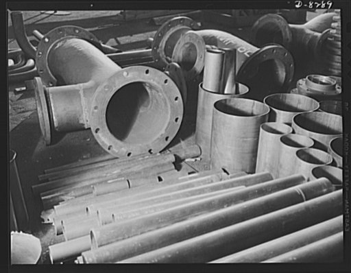 Shipbuilding. Pipes and fittings. Copper pipe and steel fittings in the pipe shop at the Wilmington, California, yard of the California Shipbuilding Corporation. The Booker T. Washington, recently launched at this yard, is one of the many freighters the company has built since Pearl Harbor