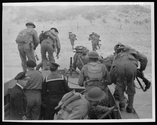 Ranger battalions train with commando troops. Troops of the ranger battalions, America's special service soldiers, are now in training somewhere in the United Kingdom. They have been attached to combined operations, commanded by Vice Admiral Lord Louis Mountbatten. Training under commando instructor