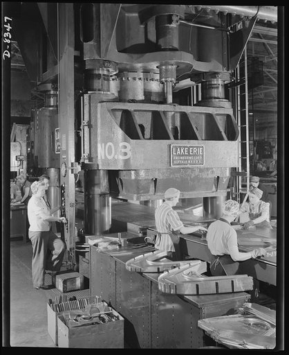 Production. B-17F heavy bomber. Parts for new B-17F (Flying Fortress) bombers are formed in a huge hydraulic press at the Boeing plant in Seattle. The Flying Fortress, a four-engine heavy bomber capable of flying at high altitudes, has performed with great credit in the South Pacific, over Germany a