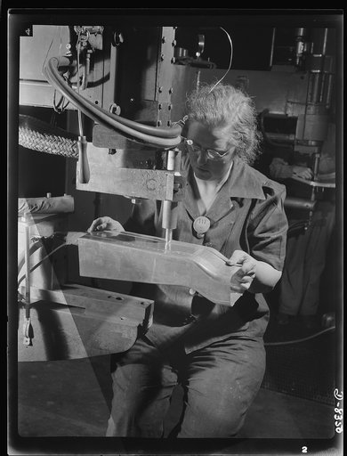 Production. B-17F heavy bomber. An electric spot welding job on a part for a new B-17F (Flying Fortress) bombers at the Boeing plant in Seattle. The Flying Fortress, a four-engine heavy bomber capable of flying at high altitudes, has performed with great credit in the South Pacific, over Germany and