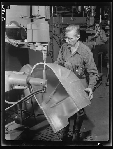 Production. B-17F heavy bomber. An electric spot welding job on a part for a new B-17F (Flying Fortress) bombers at the Boeing plant in Seattle. The Flying Fortress, a four-engine heavy bomber capable of flying at high altitudes, has performed with great credit in the South Pacific, over Germany and