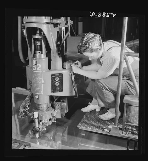 Production. B-17F heavy bomber. An electric spot welding job on a part for a new B-17F (Flying Fortress) bombers at the Boeing plant in Seattle. The Flying Fortress, a four-engine heavy bomber capable of flying at high altitudes, has performed with great credit in the South Pacific, over Germany and