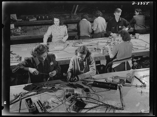 Production. B-17F heavy bomber. Electrical wiring assemblies for B-17F (Flying Fortress) bombers are made up on forming boards at the Boeing plant in Seattle. The Flying Fortress, a four-engine heavy bomber capable of flying at high altitudes, has performed with great credit in the South Pacific, ov