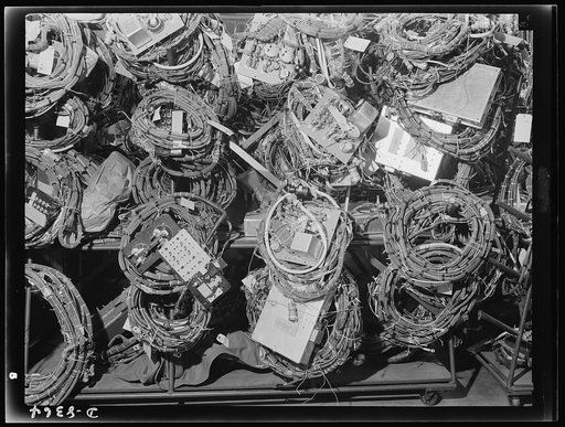Production. B-17F heavy bomber. Electrical wiring assemblies for B-17F (Flying Fortress) bombers ready for installation at the Boeing plant at Seattle. The Flying Fortress, a four-engine heavy bomber capable of flying at high altitudes, has performed with great credit in the South Pacific, over Germ