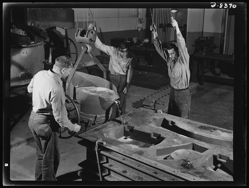 Production. B-17F heavy bomber. Pouring a lead die to be used in the production of parts for B-17F (Flying Fortress) bombers at the Boeing plant at Seattle.  The Flying Fortress, a four-engine heavy bomber capable of high altitudes, has performed with great credit in the South Pacific, over Germany 