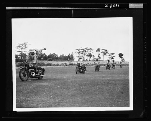 British women dispatch riders. South African girls who went to England to join the "First Aid and Nursing Yeomanry" learn stunt riding to give them balance and confidence in handling their machines. They are members of a dispatch riding section