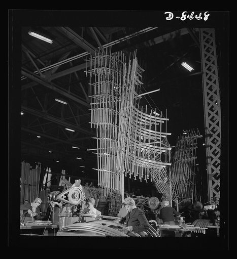 Production. B-17 heavy bomber. Sections of frameworks for B-17F (Flying Fortress) bomber fuselages at the Boeing plant in Seattle. The Flying Fortress has performed with great credit in the South Pacific, over Germany and elsewhere. It is a four-engine, heavy bomber capable of flying high altitudes